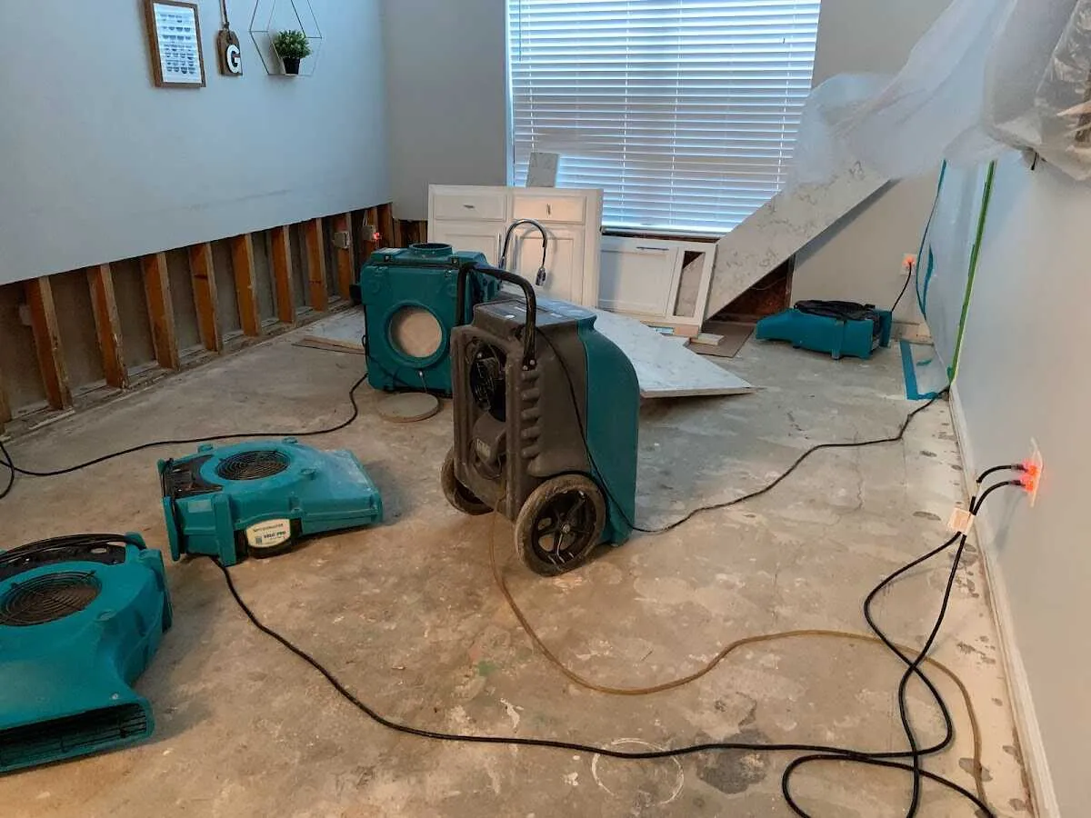 Dehumidifier in flood-cut room for Water Extraction & Removal in East End